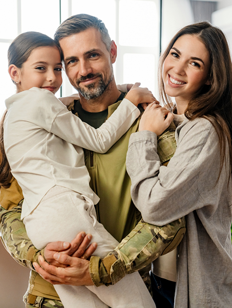 Smiling family of three after corrective orthodontic surgery in Houston