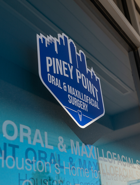 Piney Point Oral and Maxillofacial Surgery of Houston sign on the outside of the door