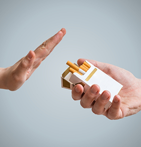 Person refusing an offer of cigarettes