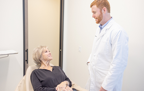Older woman at a consultation with Doctor Shepard